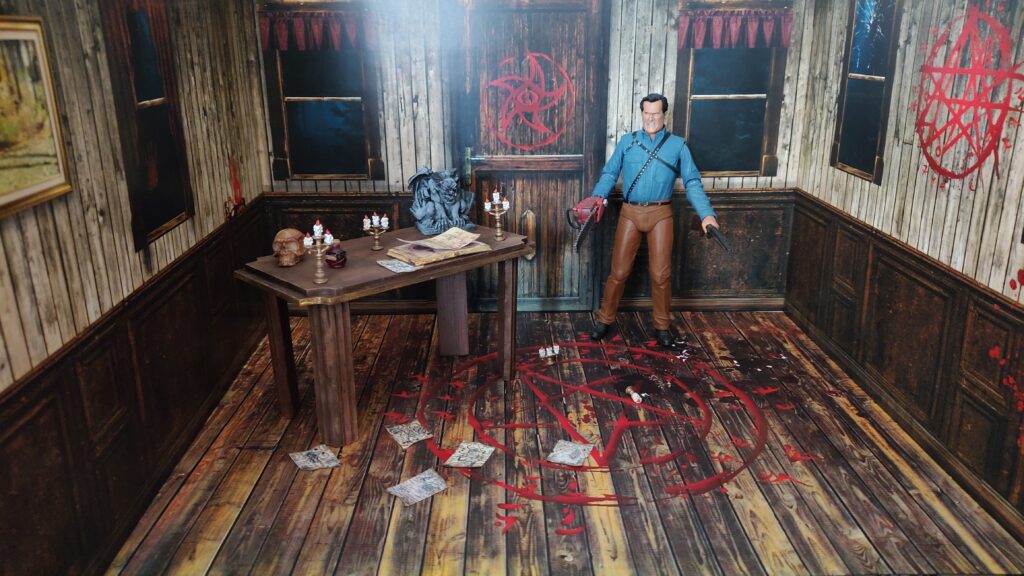 Diorama En 2D de la serie de Ash vs Evil Dead, junto con la figura de Ash totalmente nueva, marca Neca.